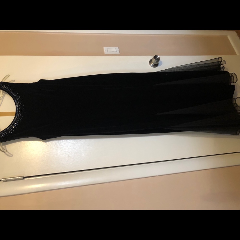 Velvet dress with beaded neckline.